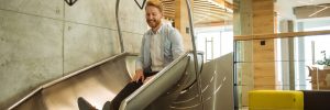 office worker on slide
