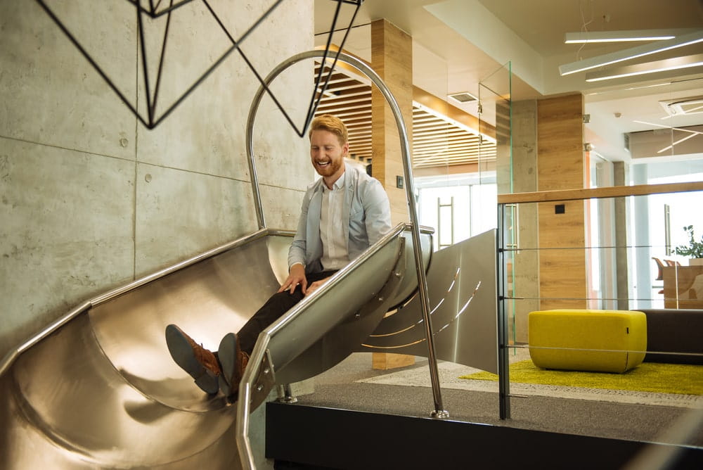 office worker on slide