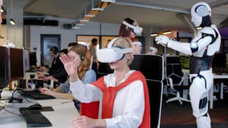 A woman wearing a vr headset in an office.
