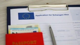 An application for swedish visa on a desk.